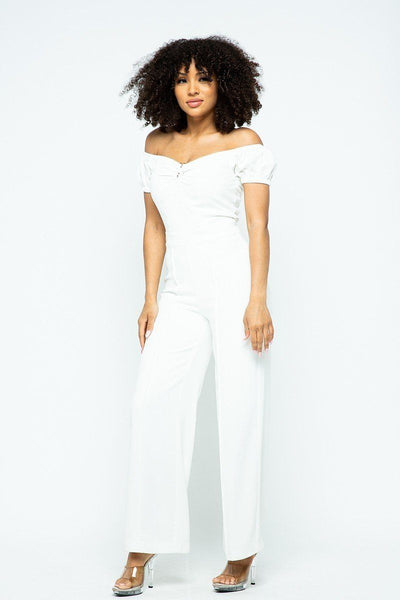 Ladies Night Out Puff Short Sleeve Jumpsuit With U Metal Details And Back Open Zippered